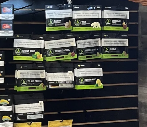 Fumari shisha packs including Banana Custard, Double Apple, French Vanilla, Guava and Lemon Mint